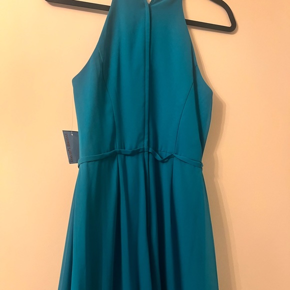 Cleaning out closet. Pics show how dress looks on - the color is oasis. - Picture 3 of 5
